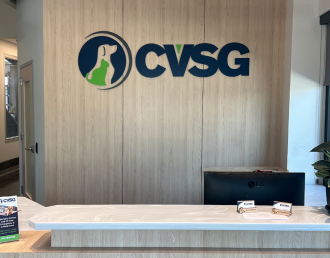 Custom indoor lobby sign in Denver commercial property showcasing branding and professional design that increases property value.